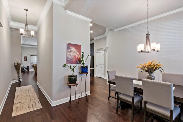 dining space featuring crown molding, baseboards, recessed lighting, a notable chandelier, and dark wood-style flooring