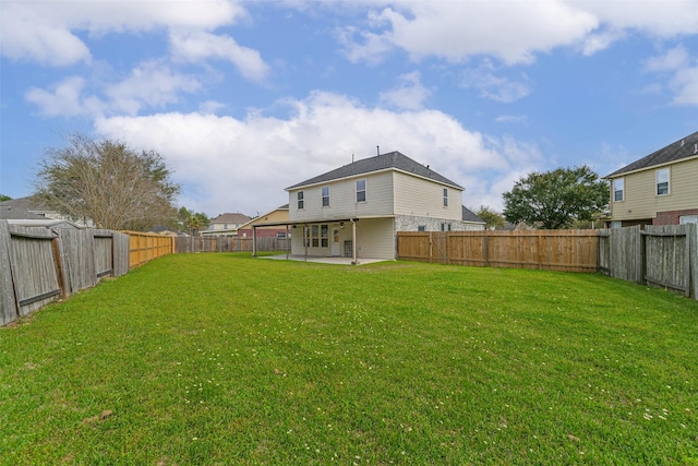 view of yard featuring a fenced backyard and a patio