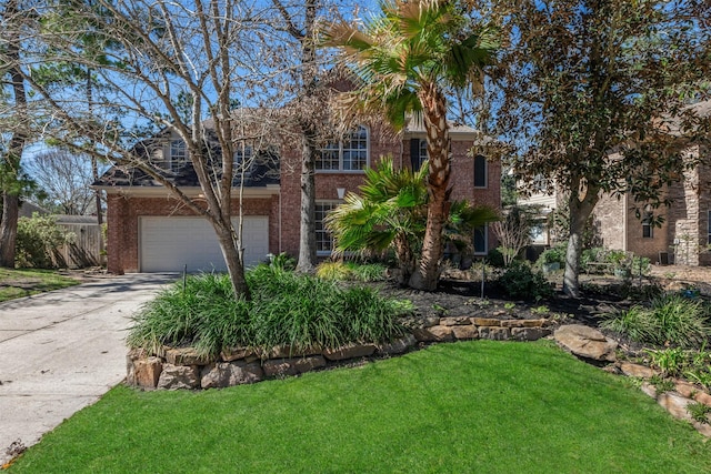 view of front of home featuring brick siding, concrete driveway, and a front lawn