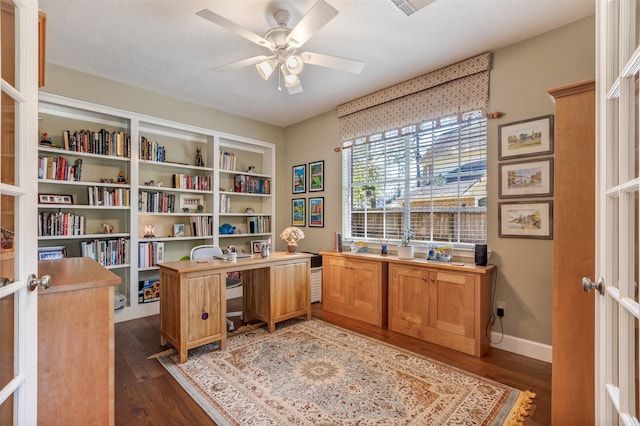 office with dark wood-style floors, french doors, and ceiling fan