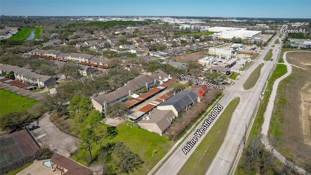 birds eye view of property with a residential view