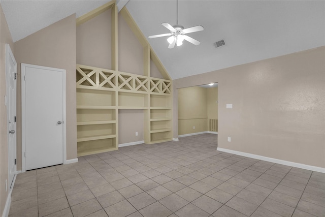 tiled empty room with a ceiling fan, built in features, baseboards, and visible vents