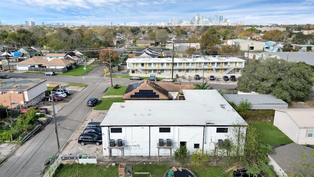 birds eye view of property with a city view