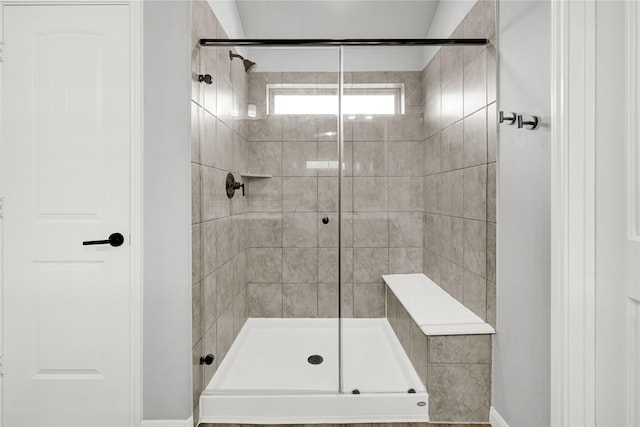 full bathroom with a shower stall