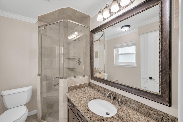 full bathroom featuring toilet, a stall shower, ornamental molding, baseboards, and vanity