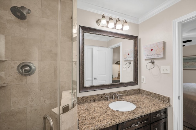 ensuite bathroom featuring a shower stall, ensuite bathroom, vanity, and crown molding