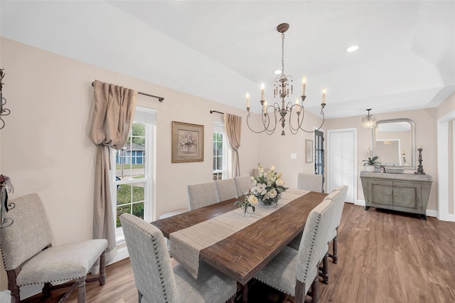 dining area with light wood-style flooring, recessed lighting, baseboards, a chandelier, and vaulted ceiling