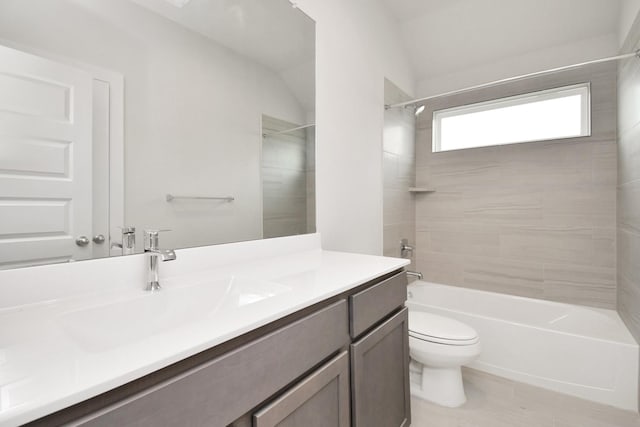 bathroom with vanity, toilet, and tub / shower combination