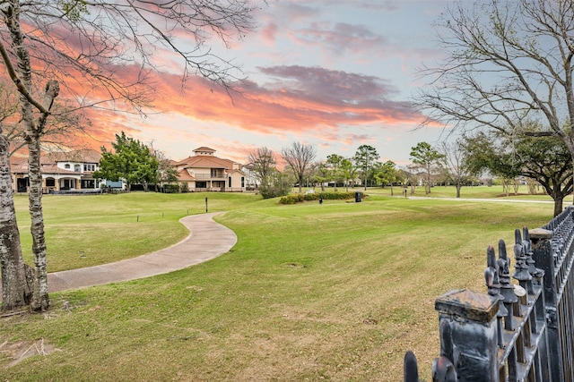 surrounding community with a yard