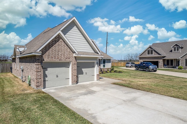 view of home's exterior with brick siding, driveway, a yard, and roof with shingles