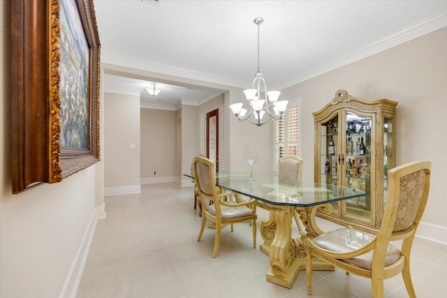 dining area featuring crown molding, a notable chandelier, light tile patterned flooring, and baseboards