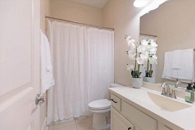 full bathroom with tile patterned floors, a shower with curtain, toilet, and vanity