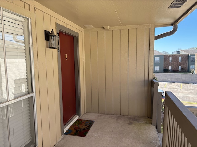 property entrance with visible vents