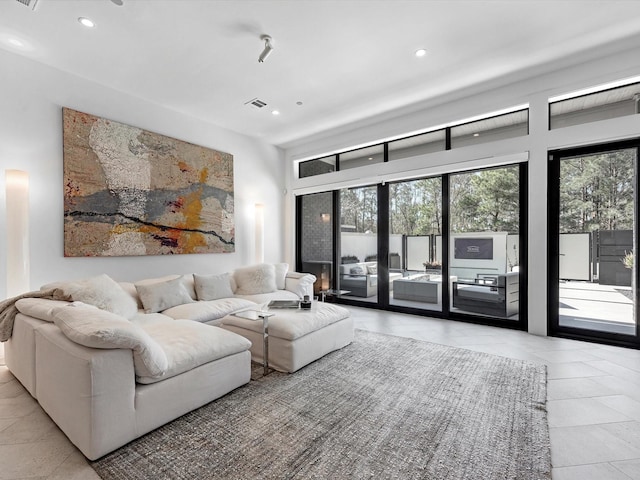 living room with visible vents and recessed lighting