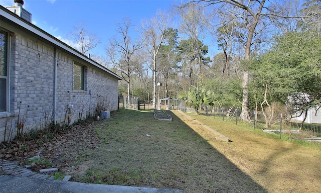 view of yard with fence