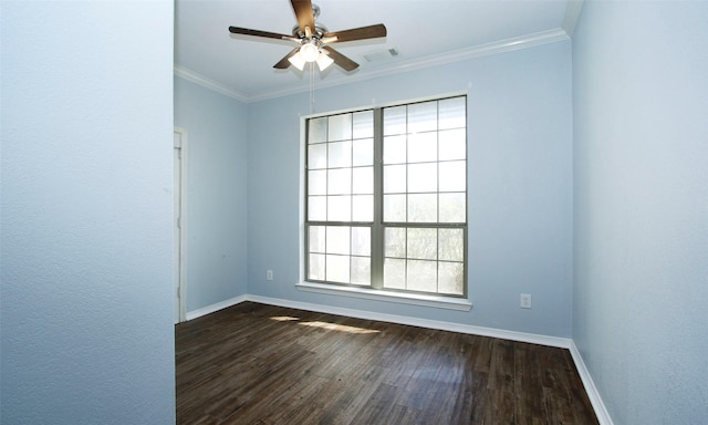 empty room with visible vents, baseboards, dark wood-style floors, and ornamental molding