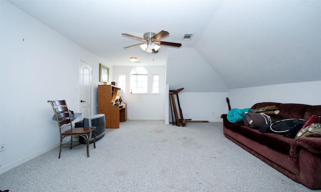 sitting room featuring visible vents, lofted ceiling, a ceiling fan, carpet floors, and baseboards