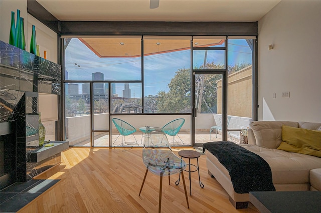 sunroom featuring a city view