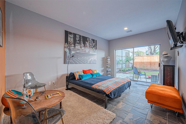 bedroom featuring recessed lighting, visible vents, baseboards, and access to exterior