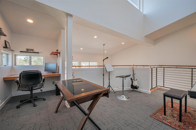 carpeted home office with recessed lighting, a high ceiling, and baseboards