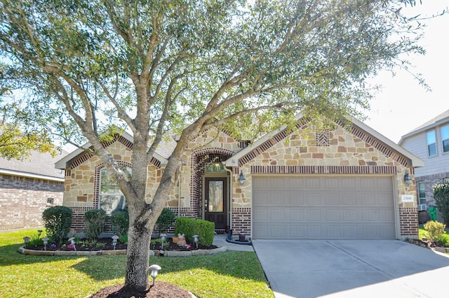 view of front of property with concrete driveway, a garage, and stone siding