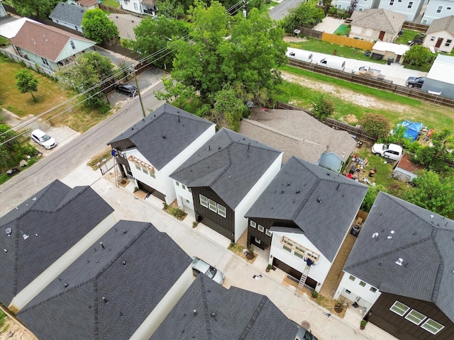 birds eye view of property with a residential view