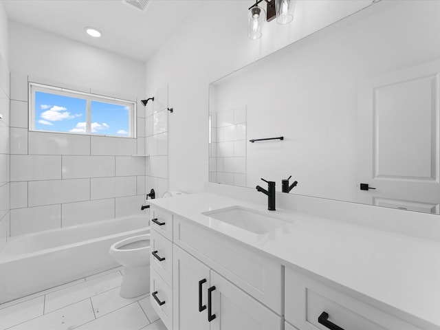 bathroom featuring vanity, toilet, visible vents, and shower / washtub combination