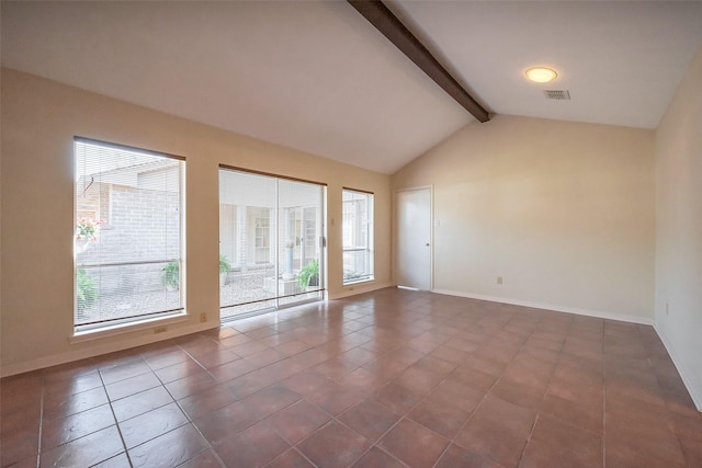 unfurnished room with visible vents, a healthy amount of sunlight, lofted ceiling with beams, and baseboards