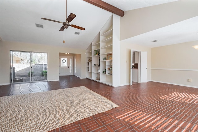 unfurnished living room featuring built in features, baseboards, and visible vents