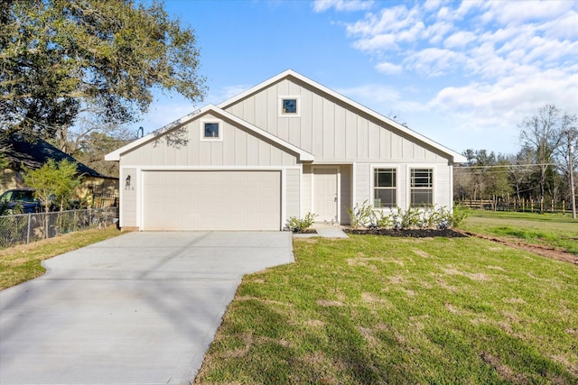 view of front facade featuring driveway, a front lawn, fence, board and batten siding, and an attached garage