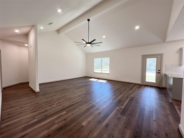 unfurnished living room featuring a ceiling fan, dark wood-style floors, visible vents, baseboards, and beam ceiling