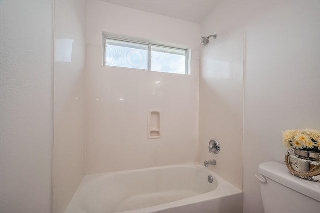 full bath featuring shower / tub combination and toilet