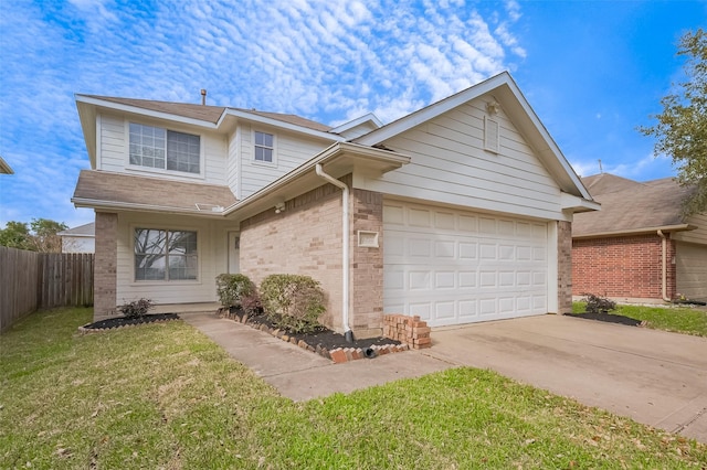 traditional-style home featuring brick siding, an attached garage, a front lawn, fence, and driveway