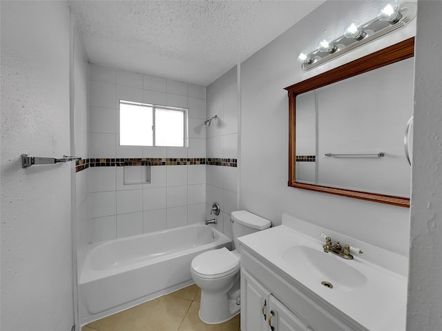 bathroom with toilet, vanity, shower / bath combination, tile patterned floors, and a textured ceiling