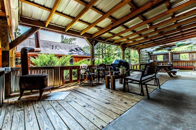 wooden deck featuring area for grilling