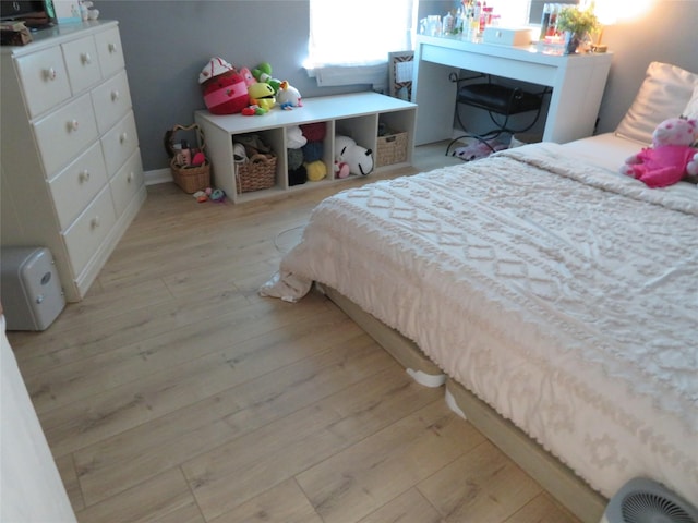 bedroom featuring light wood-type flooring