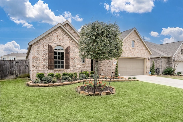 view of front of house with brick siding, driveway, and a front lawn