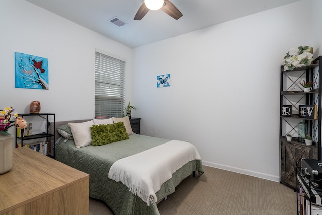 bedroom with a ceiling fan, carpet flooring, baseboards, and visible vents