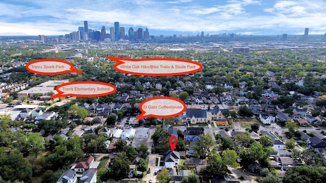 birds eye view of property featuring a view of city