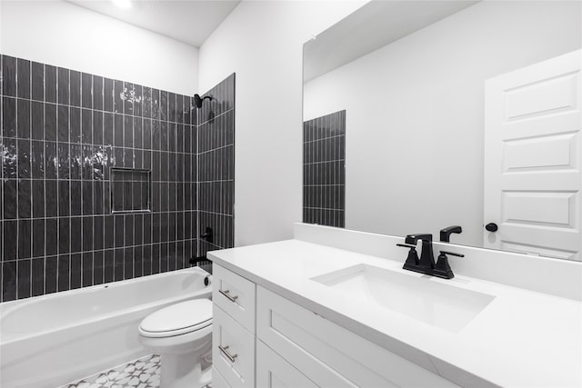 full bathroom featuring vanity, bathing tub / shower combination, and toilet