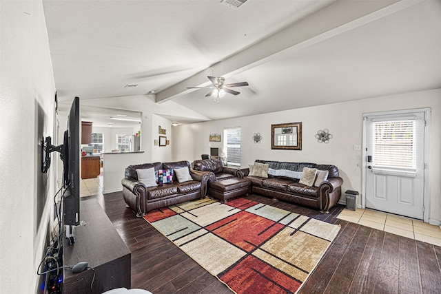 living room with vaulted ceiling with beams, ceiling fan, and hardwood / wood-style flooring