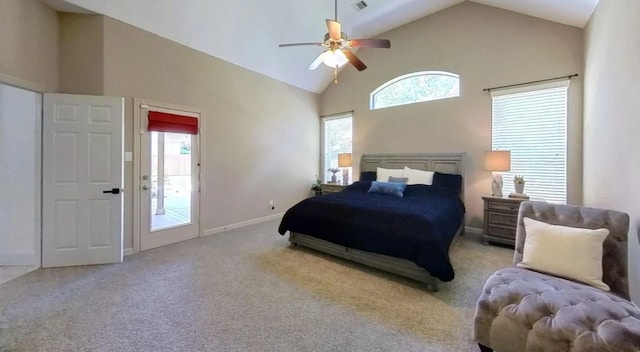 bedroom featuring multiple windows, baseboards, carpet floors, and high vaulted ceiling