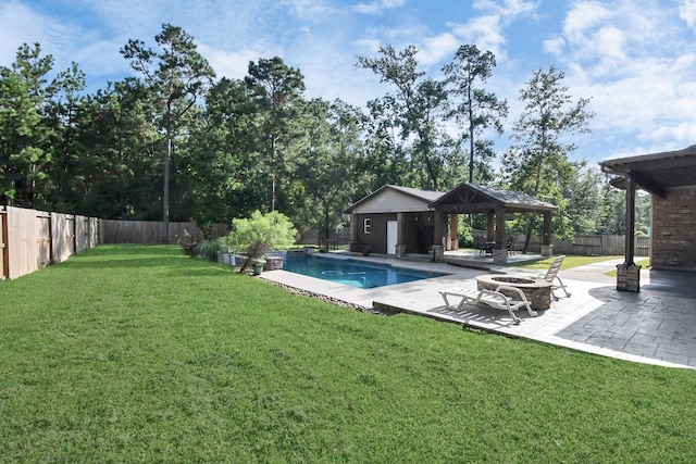 view of swimming pool featuring a fenced in pool, a fenced backyard, a gazebo, a patio area, and a lawn