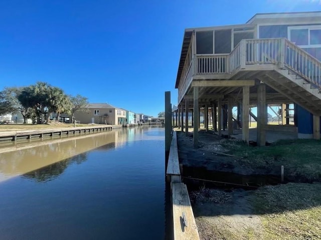 dock area with a water view