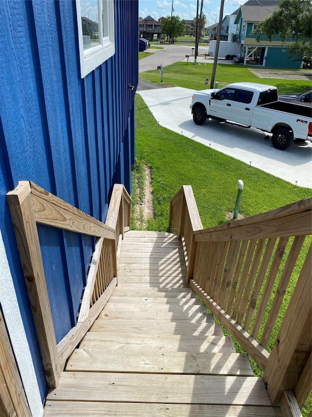 9 Flounder Cir, Freeport, TX 77541 - wooden deck featuring a yard and a residential view