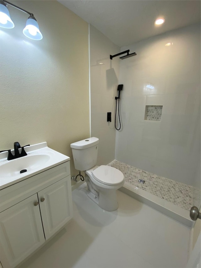 9 Flounder Cir, Freeport, TX 77541 - bathroom with tiled shower and vanity