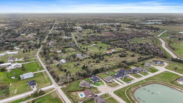 aerial view featuring a residential view and a water view