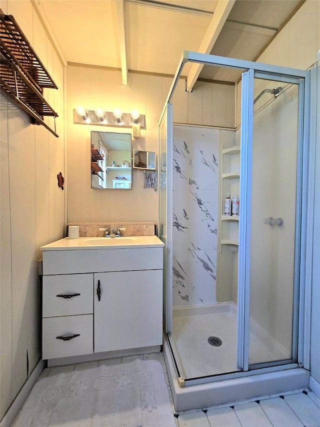 full bath featuring a shower stall and vanity