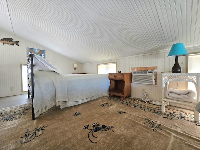 unfurnished bedroom featuring a wall mounted air conditioner and vaulted ceiling