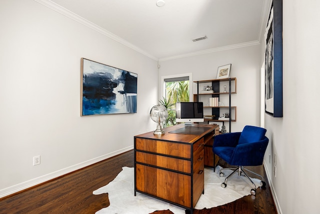 office area featuring visible vents, ornamental molding, baseboards, and wood finished floors